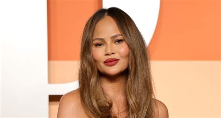 Chrissy Teigen Reveals Swollen & Bandaged Stomach After Endometriosis Surgery — Watch