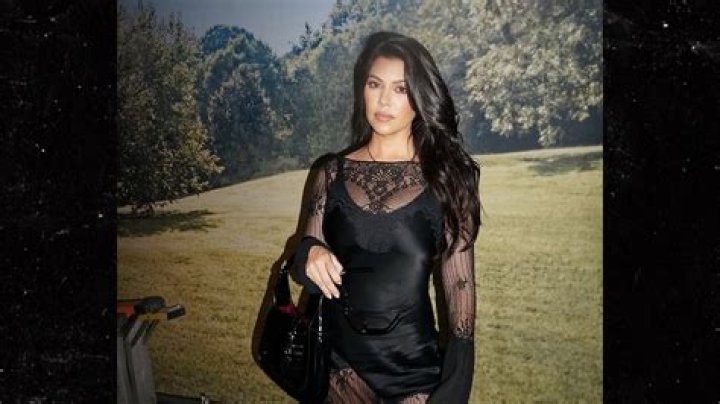 Kourtney Kardashian Stuns & Shows Off Her Curves In Skintight Bodysuit In LA